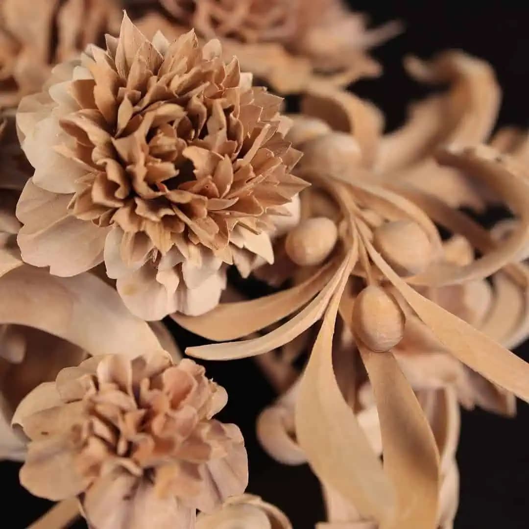 Detailed limewood peony flowers and buds, a custom wood carving by Alexander Grabovetskiy.