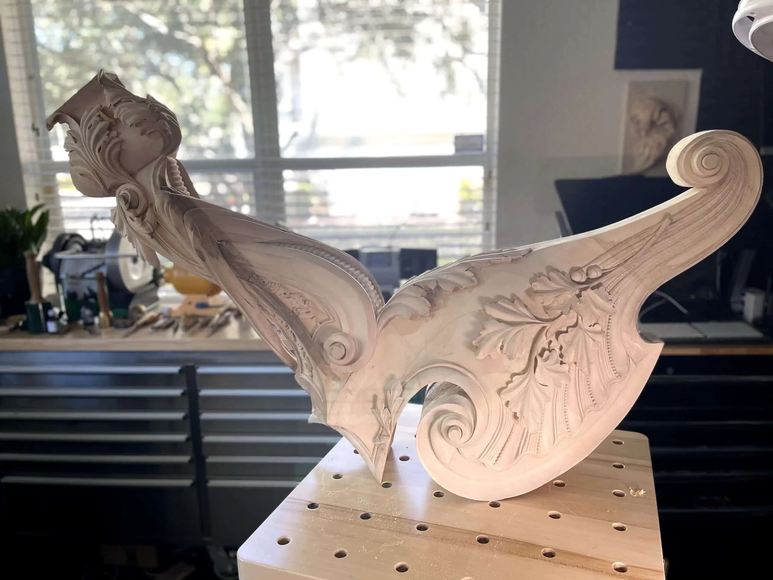 Limewood figural cornucopia with a maiden's head and acanthus scrolls, a custom wood carving by Alexander Grabovetskiy.