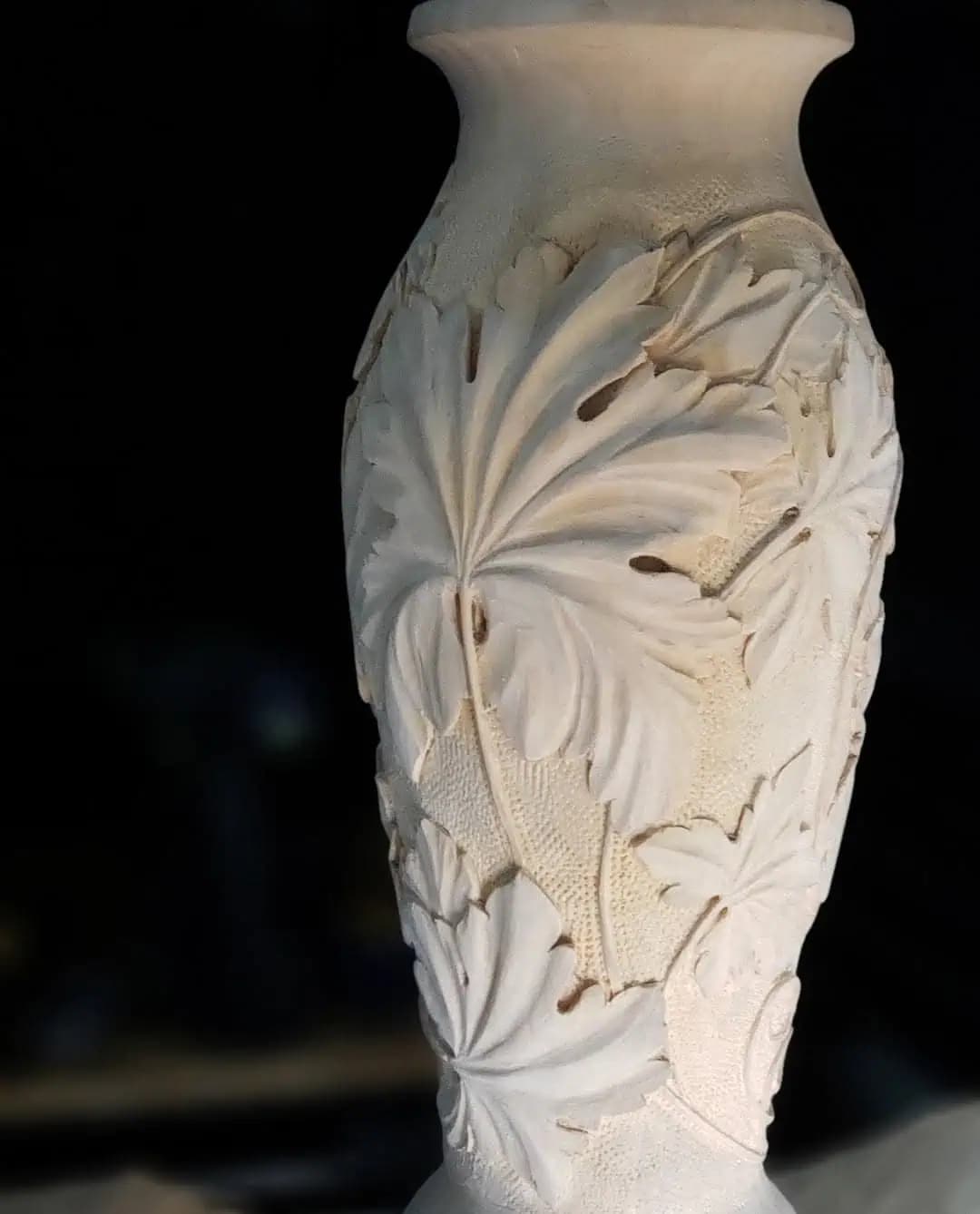 Limewood vase with deeply carved acanthus leaves and punched ground by Alexander Grabovetskiy, a custom wood carving.