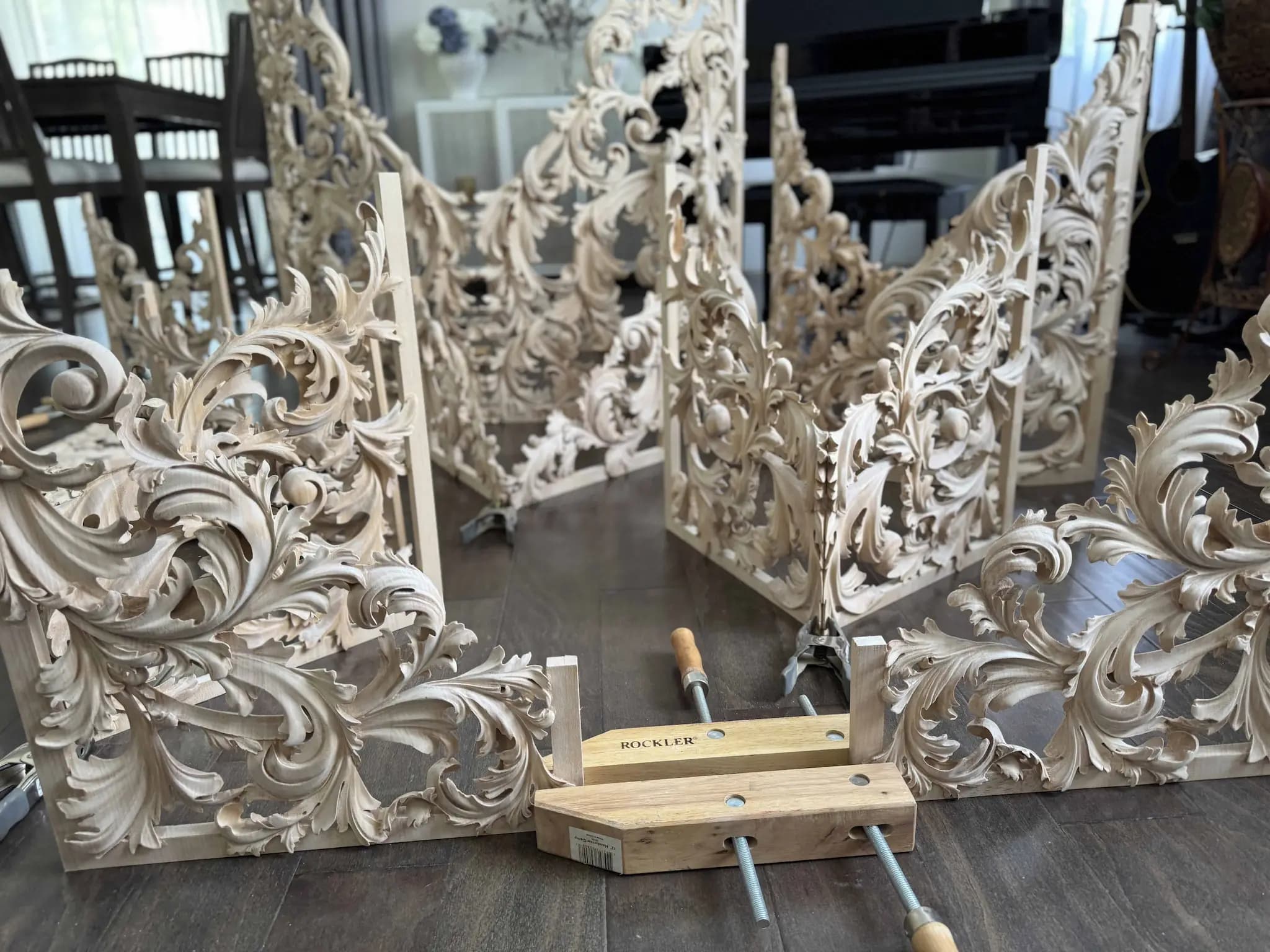 Limewood organ shades with flowing acanthus scrolls, custom wood carving by Alexander Grabovetskiy, mid-assembly.