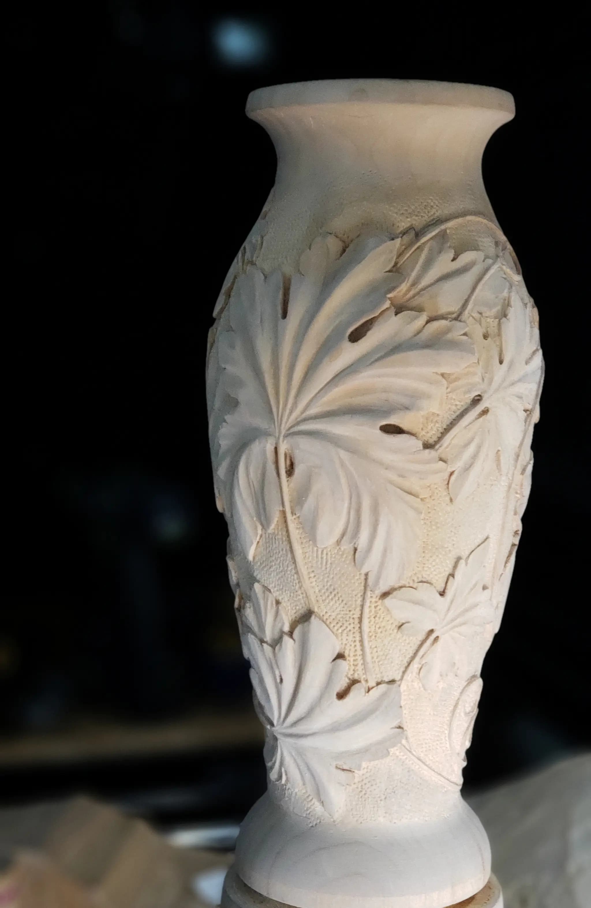 Turned limewood vase with deep-relief acanthus leaves, a custom wood carving by Alexander Grabovetskiy.